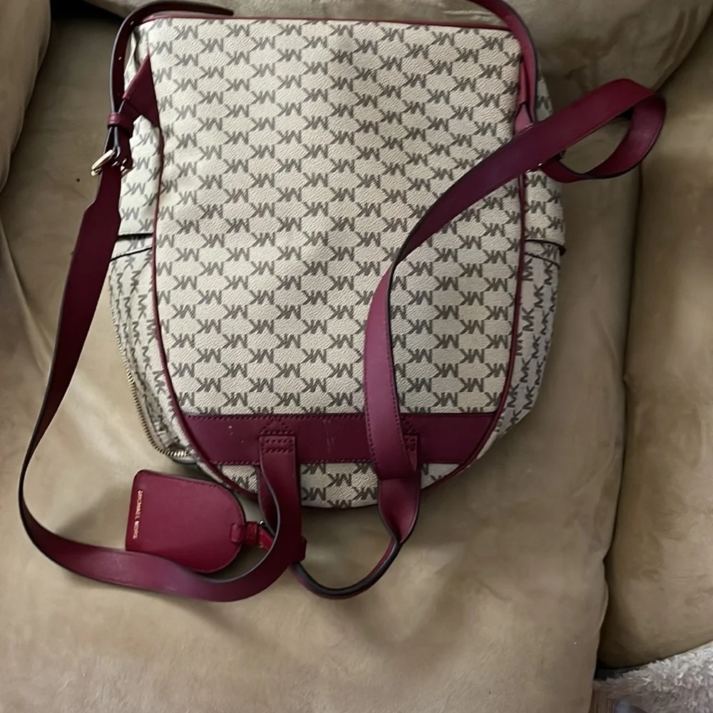 Michael Kors backpack a regular sized. Tan & burgundy with all the zippers. - Picture 7 of 8